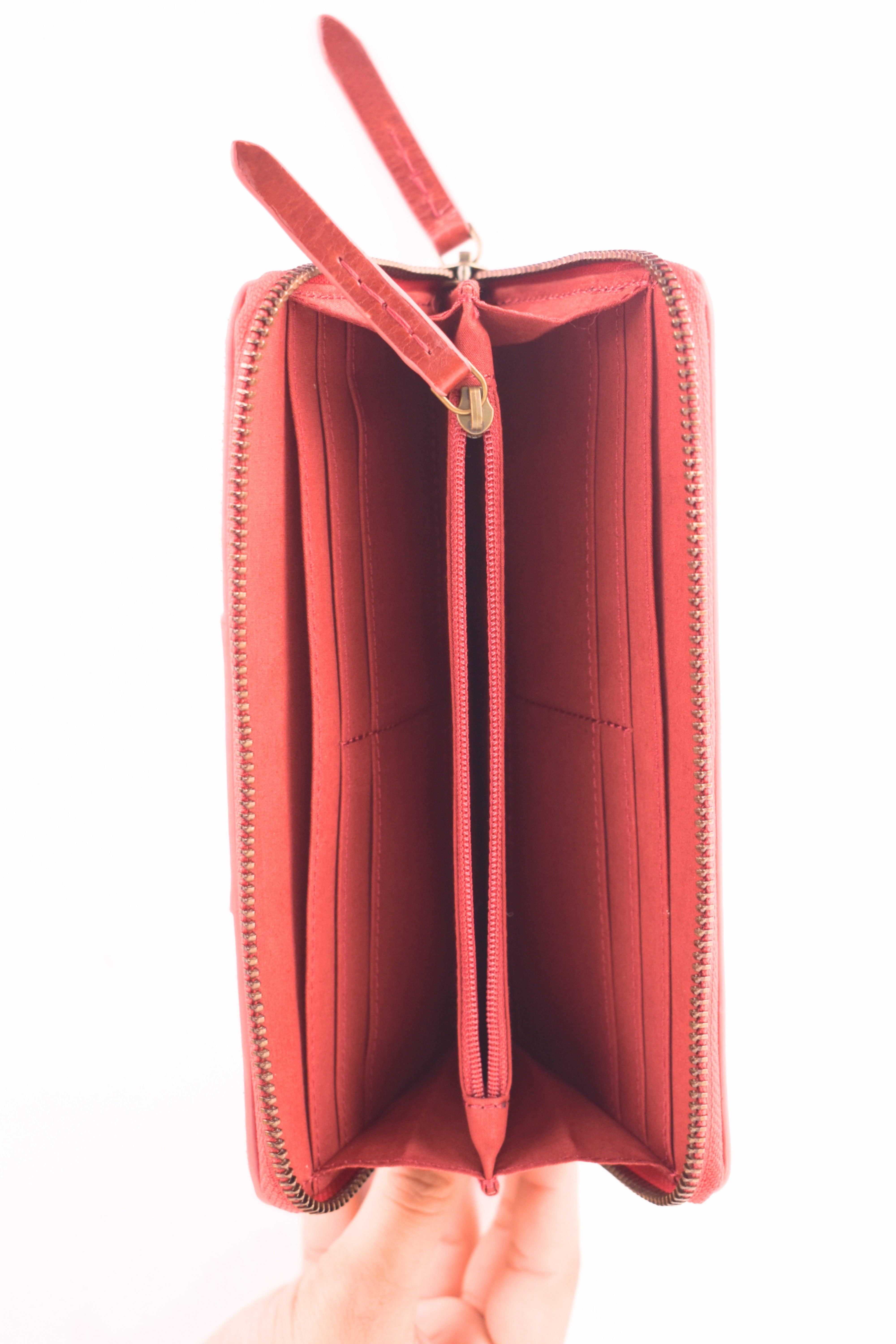 Crimson Crest Leather Clutch